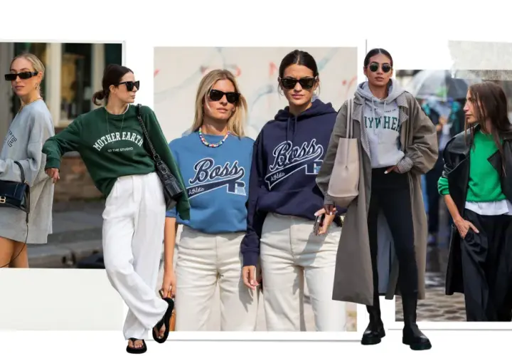 Mujeres con estilo lucen un **hoodie** gris, verde, azul y marino, combinados con pantalones y abrigos.