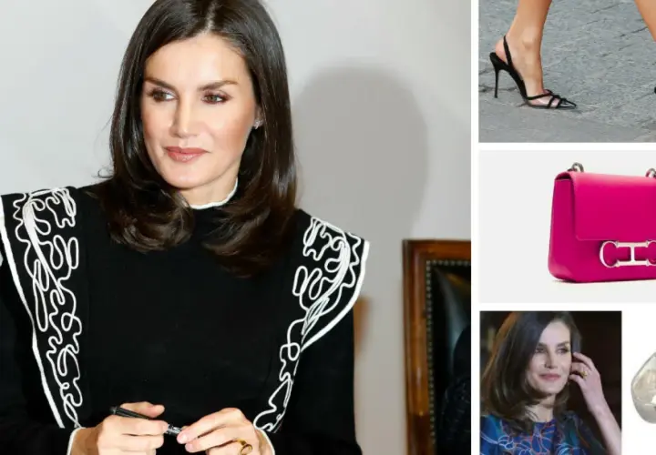 Letizia Ortiz, elegante en negro con detalles blancos, junto a un bolso fucsia y zapatos de tacón.