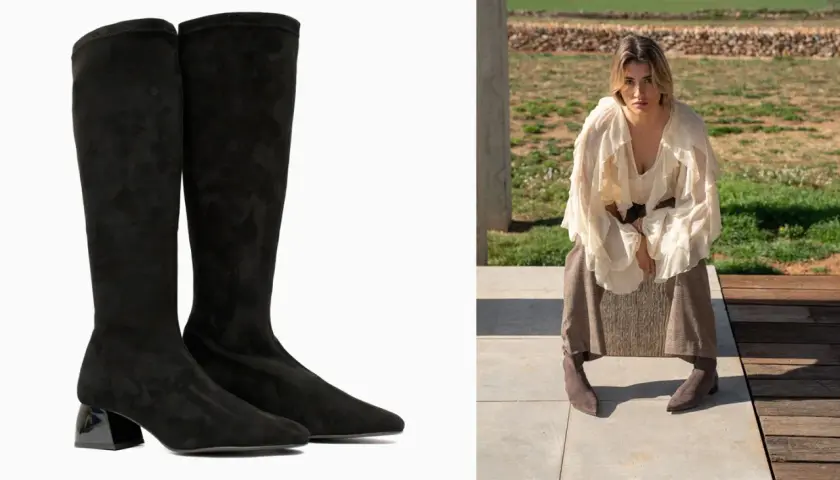 Botas altas negras de ante con tacón geométrico, perfectas para estilizar las piernas.