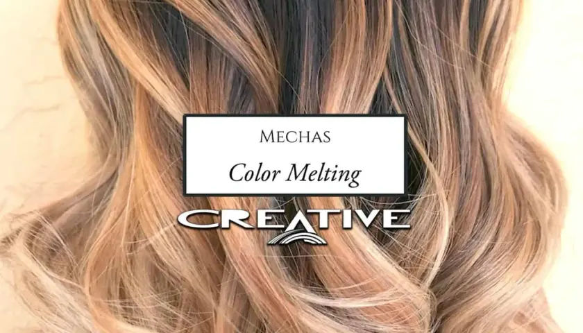 Mechas color melting en cabello rubio y castaño, con un degradado suave y natural.