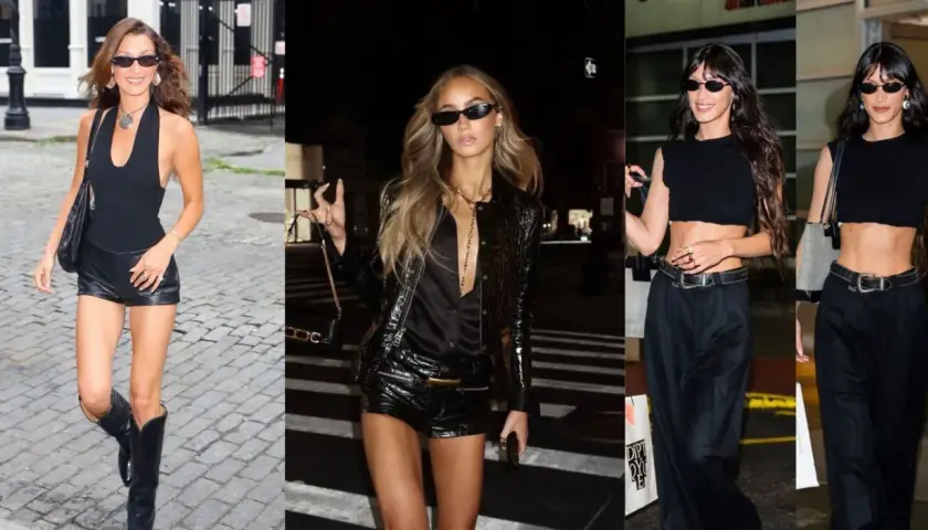 Tres mujeres con atuendos negros, una con botas de cuero y shorts, otra con chaqueta brillante y shorts, y la tercera con top corto y pantalones anchos, evocan un estilo glam rock.