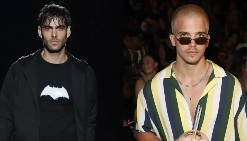 Dos modelos españoles hombres, uno con camiseta negra y logo de Batman, el otro con camisa a rayas y gafas de sol.