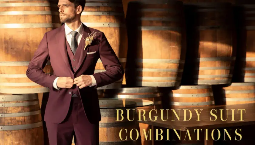 Hombre con traje burdeos, camisa blanca y corbata gris. Un estilo elegante para combinar color burdeos hombre.