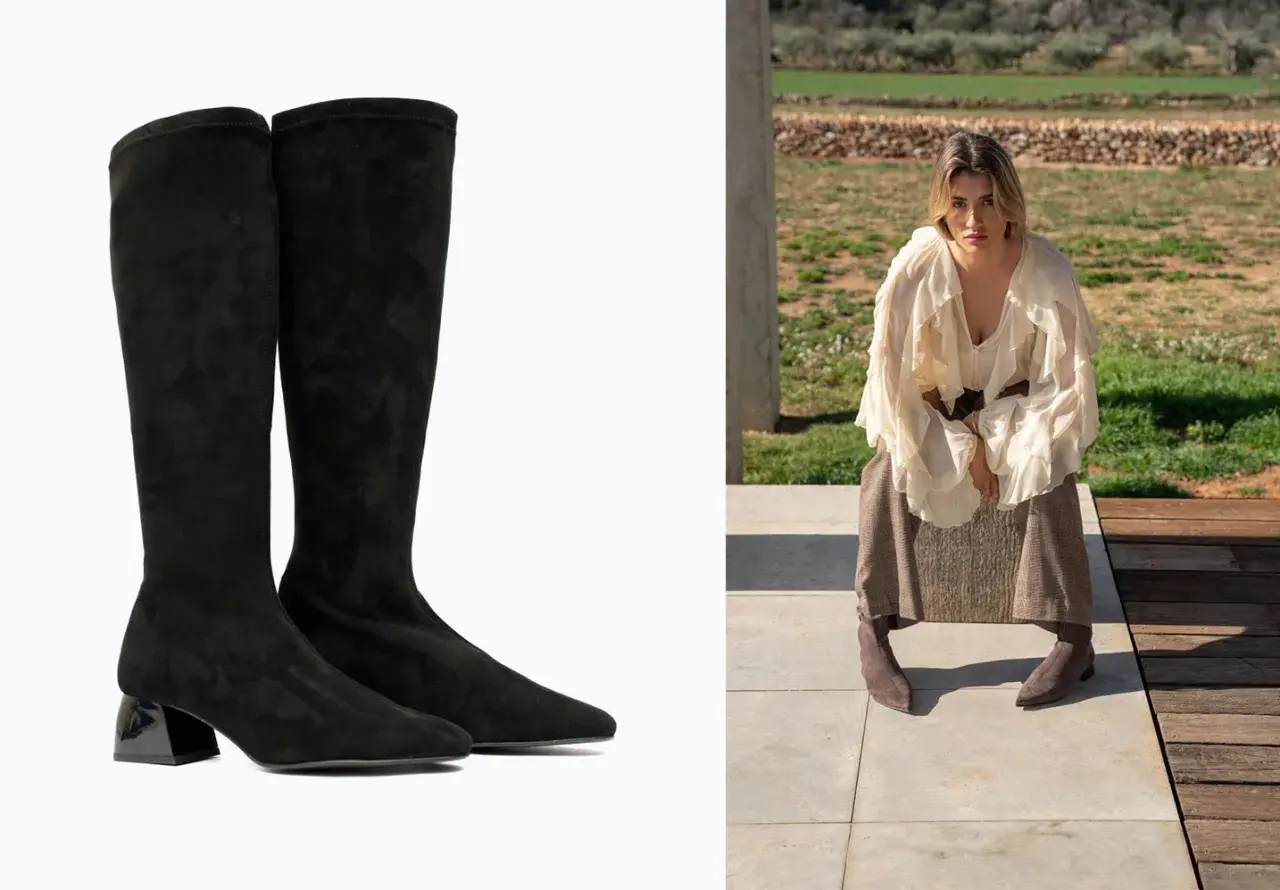 Botas altas negras de ante con tacón geométrico, perfectas para estilizar las piernas.