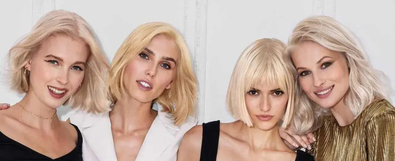 Cuatro mujeres rubias con diferentes estilos de cabello, incluyendo un corte choppy bob moderno y elegante.