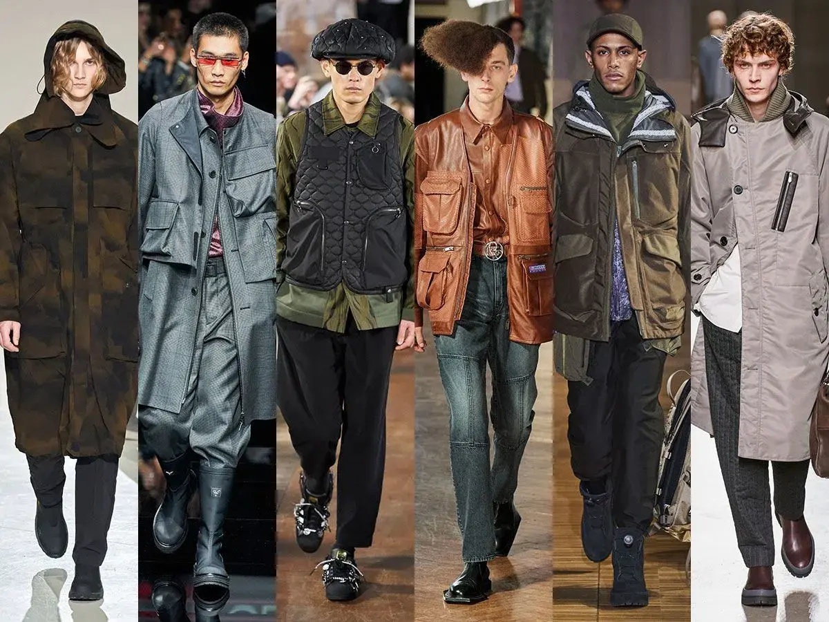 Modelos desfilan con abrigos y chalecos de estilo workwear, con múltiples bolsillos y texturas.